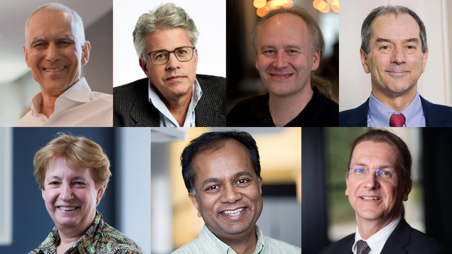 A collage of seven professionally dressed adults, consisting of six men and one woman, all smiling or with neutral expressions, photographed in various indoor settings.